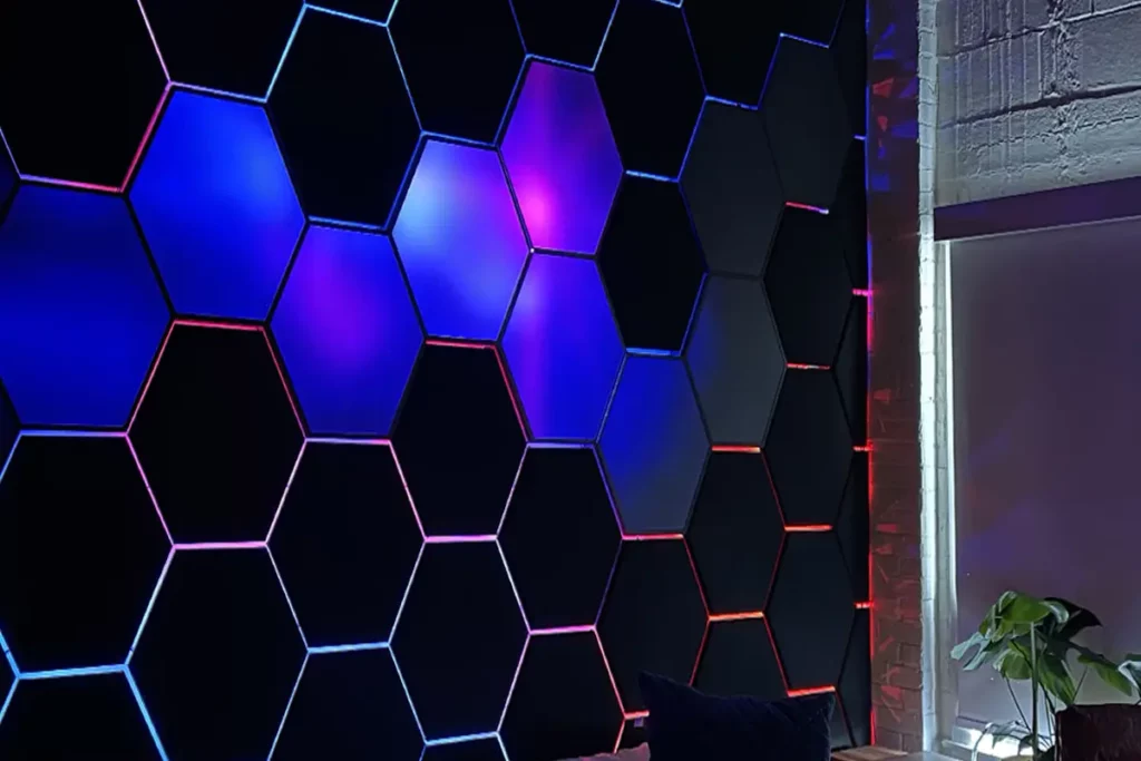 hexagon shaped acrylic tile eq wall blue and black with pink lines led lighting a plank in the room
