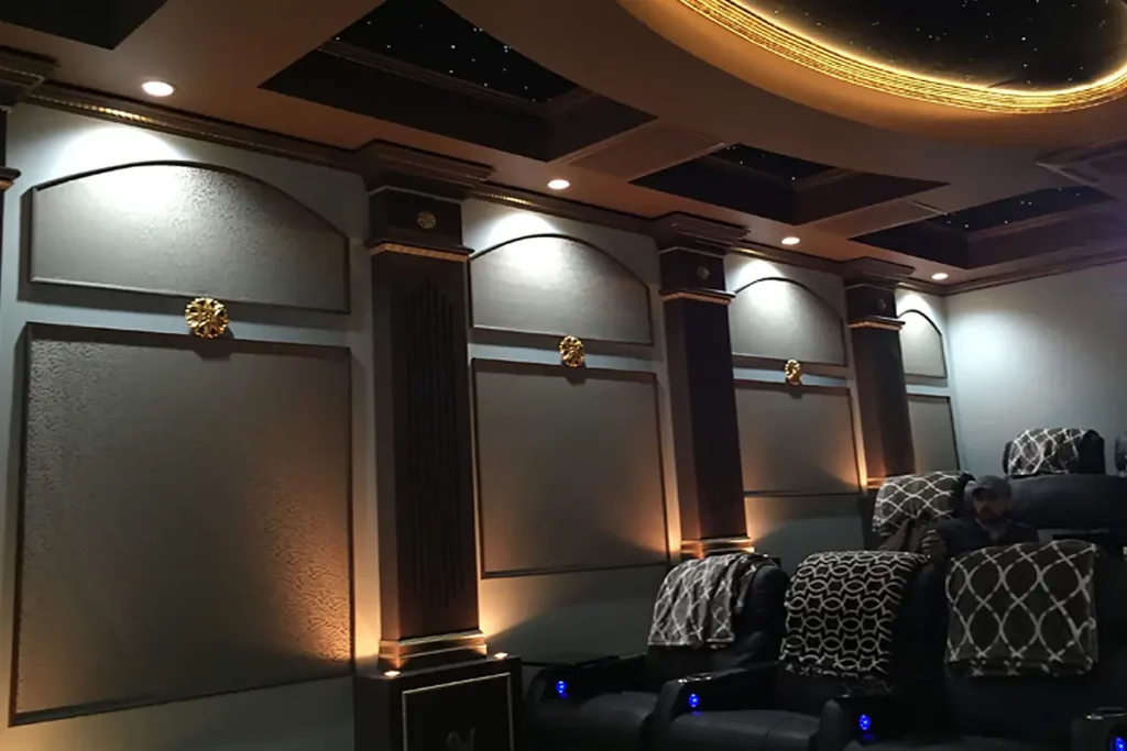 home theater wall with column lights and led star ceiling and yellow halo lighting move seats facing forward